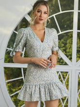 Load image into Gallery viewer, Floral Tie-Cuff Puff Sleeve Ruffle Hem Dress