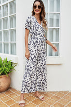 Load image into Gallery viewer, Printed Tie-Waist Surplice Jumpsuit
