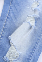 Load image into Gallery viewer, Button Front Frayed Ankle Skinny Jeans
