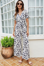 Load image into Gallery viewer, Printed Tie-Waist Surplice Jumpsuit
