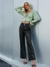 Load image into Gallery viewer, Side Tie Cutout PU Leather Flare Pants
