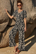 Load image into Gallery viewer, Printed Tie-Waist Surplice Jumpsuit
