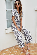 Load image into Gallery viewer, Printed Tie-Waist Surplice Jumpsuit
