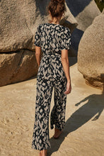 Load image into Gallery viewer, Printed Tie-Waist Surplice Jumpsuit
