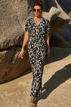 Load image into Gallery viewer, Printed Tie-Waist Surplice Jumpsuit
