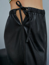 Load image into Gallery viewer, Side Tie Cutout PU Leather Flare Pants
